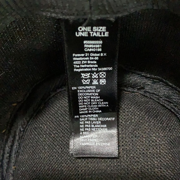 Tan forever 21 paper fedora with black band and feather detail! - Picture 5 of 5